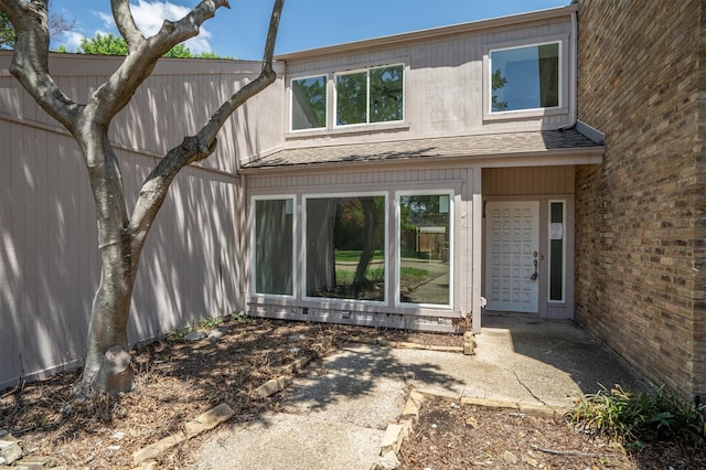 4209 Brooktree Ln, Dallas, TX 75287 - doorway to property with roof with shingles