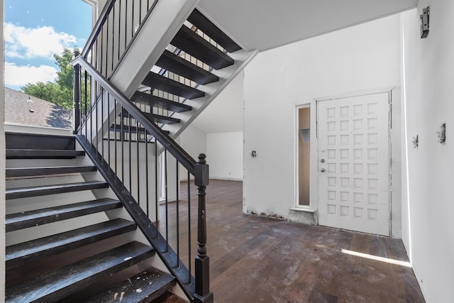 4209 Brooktree Ln, Dallas, TX 75287 - entryway featuring wood finished floors, stairs, and a high ceiling