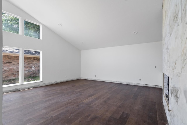 4209 Brooktree Ln, Dallas, TX 75287 - bonus room featuring lofted ceiling, dark wood finished floors, and a fireplace