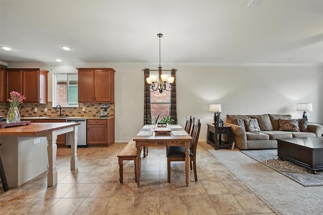 7732 Anatolian Way, Fort Worth, TX 76131 - dining area with a chandelier, crown molding, and recessed lighting