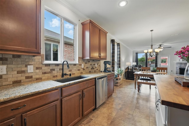 7732 Anatolian Way, Fort Worth, TX 76131 - kitchen with dishwasher, butcher block counters, open floor plan, and decorative backsplash