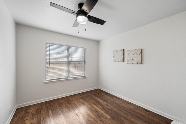 1905 S 51st St, Temple, TX 76504 - spare room with ceiling fan and dark wood-style flooring