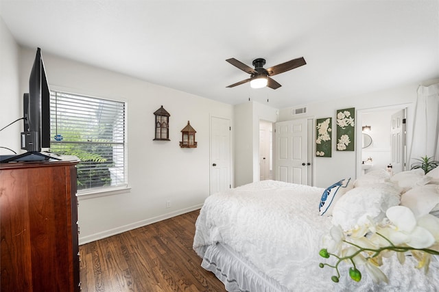 1905 S 51st St, Temple, TX 76504 - bedroom with dark wood-style floors and a ceiling fan