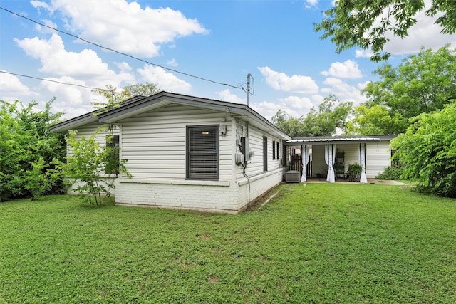 1905 S 51st St, Temple, TX 76504 - view of property exterior with a yard and a central air condition unit