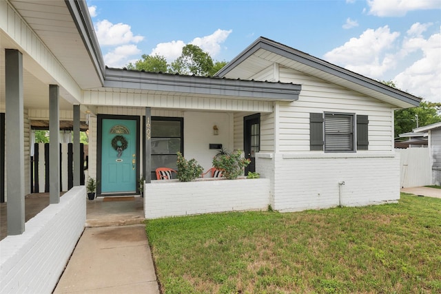 1905 S 51st St, Temple, TX 76504 - view of front of home with covered porch and brick siding