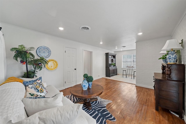 1905 S 51st St, Temple, TX 76504 - living area featuring wood finished floors and recessed lighting