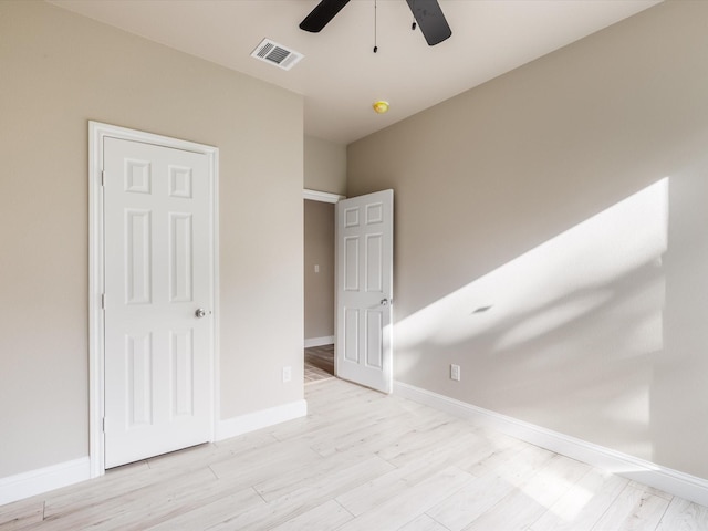 1510 N Wilhite St, Cleburne, TX 76031 - unfurnished bedroom with light wood-style flooring and a ceiling fan