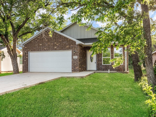1510 N Wilhite St, Cleburne, TX 76031 - view of front facade with brick siding, board and batten siding, an attached garage, a front yard, and concrete driveway
