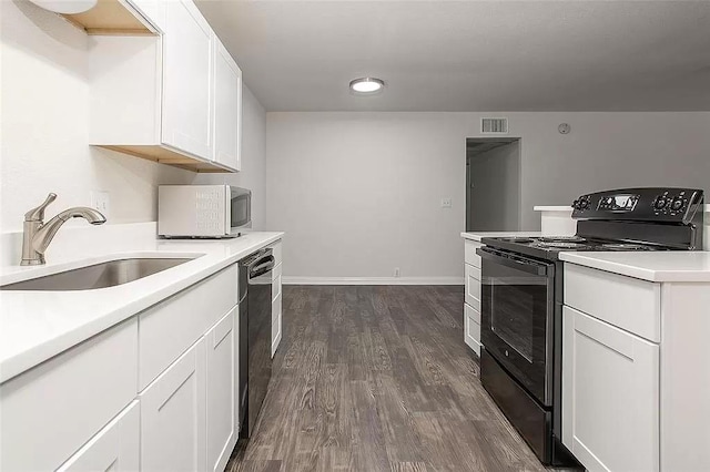5020 Donnelly Ave Unit 5022, Fort Worth, TX 76107 - kitchen with black electric range oven, white microwave, dishwasher, light countertops, and dark wood-style floors