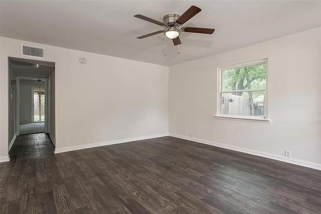 5020 Donnelly Ave Unit 5022, Fort Worth, TX 76107 - empty room featuring ceiling fan, plenty of natural light, and dark wood finished floors