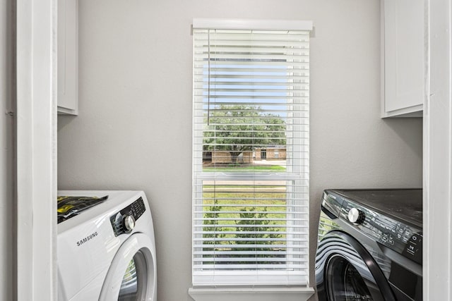 1722 Brighton Dr, Carrollton, TX 75007 - laundry room featuring washer and clothes dryer and cabinet space