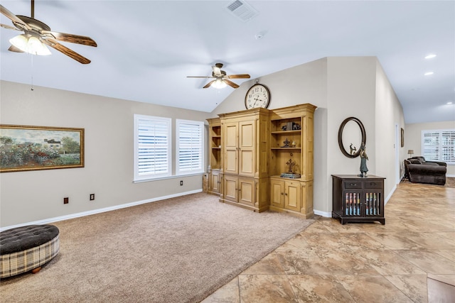529 Cambridge Dr, Saginaw, TX 76179 - living area featuring ceiling fan, lofted ceiling, and light carpet