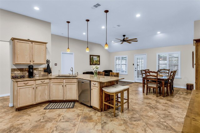 529 Cambridge Dr, Saginaw, TX 76179 - kitchen with light brown cabinetry, dishwasher, a peninsula, vaulted ceiling, and ceiling fan