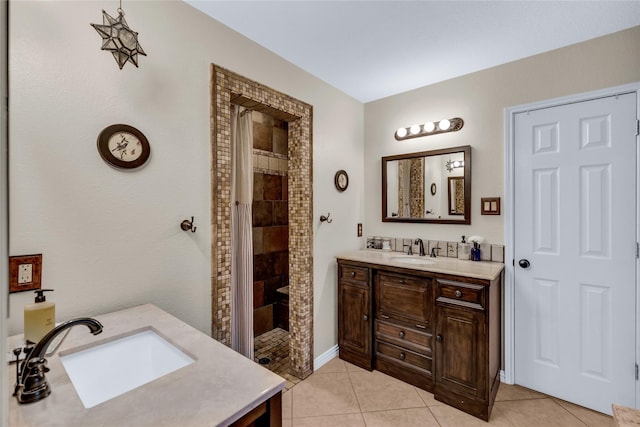 529 Cambridge Dr, Saginaw, TX 76179 - full bath featuring vanity, a tile shower, and tile patterned flooring