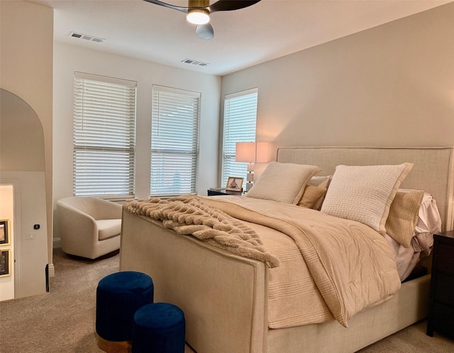 2413 Latimer Mews, Celina, TX 75009 - carpeted bedroom featuring arched walkways and ceiling fan