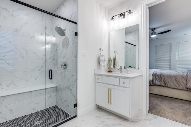 2413 Latimer Mews, Celina, TX 75009 - ensuite bathroom featuring marble finish flooring, a marble finish shower, a ceiling fan, and vanity