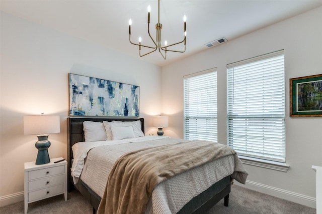 2413 Latimer Mews, Celina, TX 75009 - carpeted bedroom featuring a chandelier and baseboards