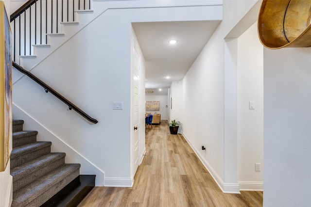 2413 Latimer Mews, Celina, TX 75009 - hallway featuring light wood finished floors, recessed lighting, and stairway