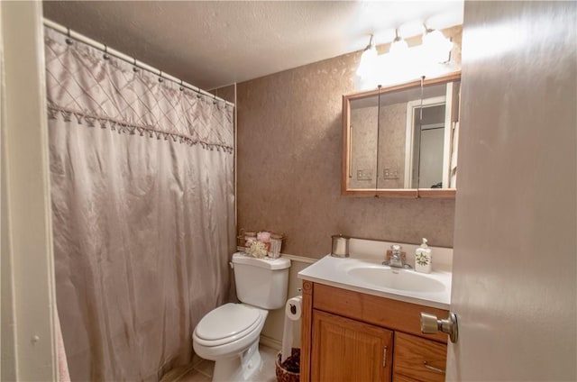 1002 Hawthorne Dr, Allen, TX 75002 - bathroom with vanity, a shower with curtain, a textured ceiling, and tile patterned flooring