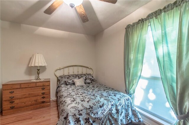 1002 Hawthorne Dr, Allen, TX 75002 - bedroom featuring wood finished floors and a ceiling fan