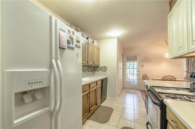 1002 Hawthorne Dr, Allen, TX 75002 - kitchen featuring white refrigerator with ice dispenser, electric stove, dishwasher, and light countertops