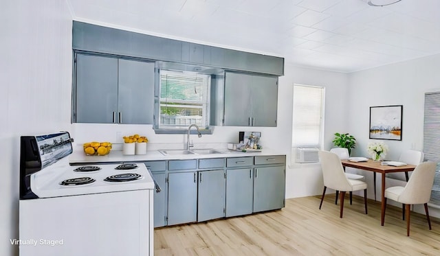 107 Quillen, Whitesboro, TX 76273 - kitchen with white electric range oven, light wood-style flooring, light countertops, and cooling unit