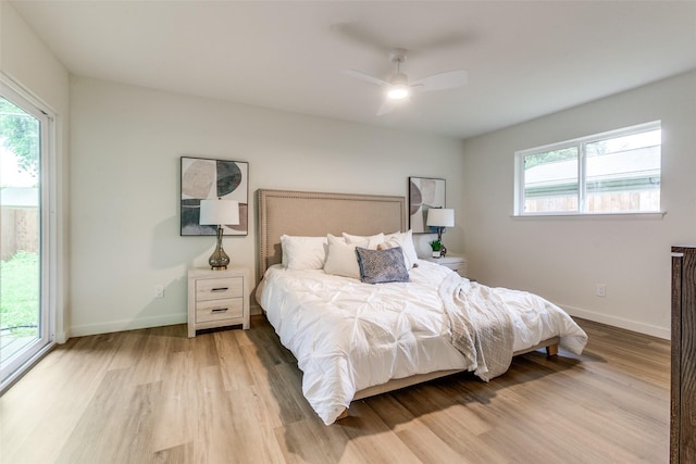 430 Cambridge Dr, Richardson, TX 75080 - bedroom with light wood-style flooring and a ceiling fan