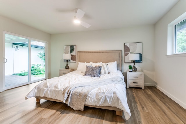 430 Cambridge Dr, Richardson, TX 75080 - bedroom with access to exterior, wood finished floors, and a ceiling fan