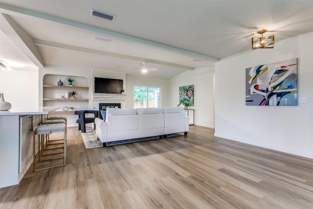 430 Cambridge Dr, Richardson, TX 75080 - living area featuring light wood-style floors and a fireplace