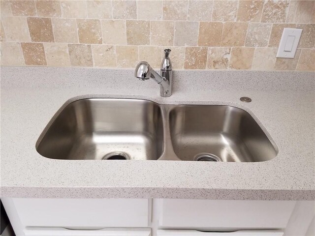 4748 Old Bent Tree Ln Unit 906, Dallas, TX 75287 - kitchen view of a sink and light stone countertops