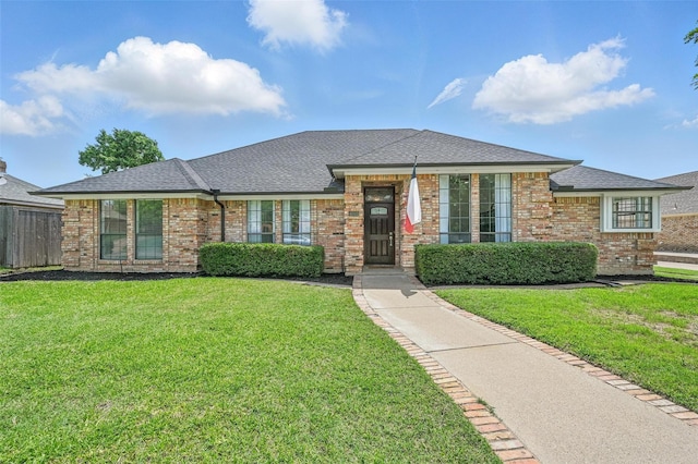 4003 Tuscany Ln, Arlington, TX 76016 - view of front of house featuring brick siding and roof with shingles