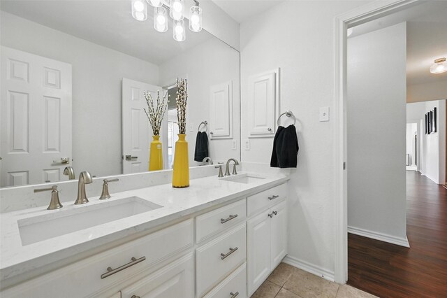 4003 Tuscany Ln, Arlington, TX 76016 - bathroom with double vanity and baseboards
