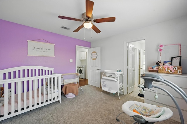 4003 Tuscany Ln, Arlington, TX 76016 - carpeted bedroom with washer / clothes dryer, a ceiling fan, and a crib