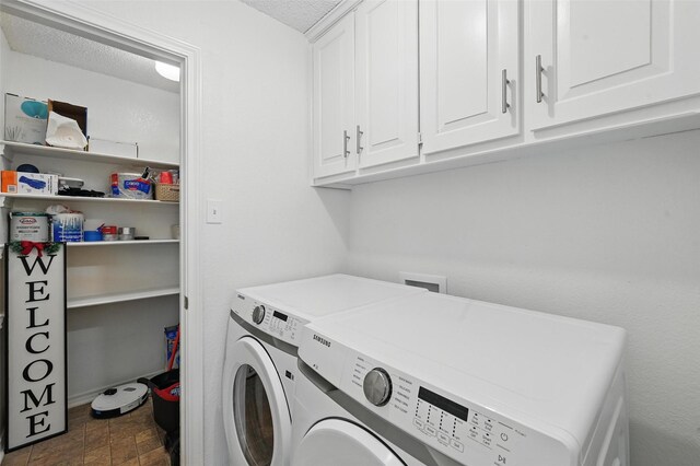 4003 Tuscany Ln, Arlington, TX 76016 - washroom featuring cabinet space, independent washer and dryer, and a textured ceiling