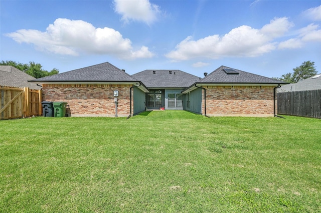 4003 Tuscany Ln, Arlington, TX 76016 - back of house with a fenced backyard, a shingled roof, and brick siding