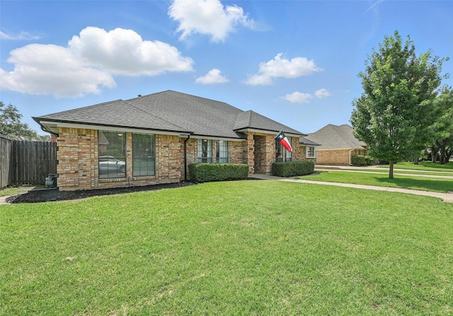 4003 Tuscany Ln, Arlington, TX 76016 - view of front of home with brick siding and a shingled roof