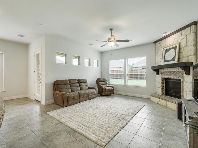709 Providence, Wylie, TX 75098 - living room with a ceiling fan, plenty of natural light, a fireplace, and light tile patterned floors