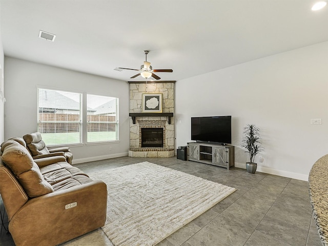 709 Providence, Wylie, TX 75098 - living area with a ceiling fan and a stone fireplace