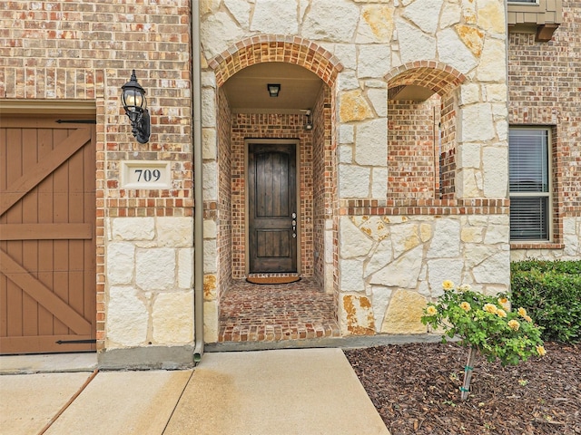709 Providence, Wylie, TX 75098 - property entrance featuring brick siding and stone siding