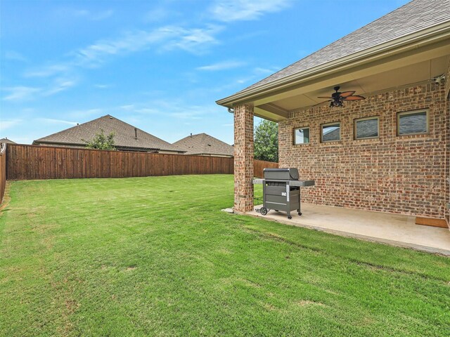 709 Providence, Wylie, TX 75098 - fenced backyard featuring a ceiling fan and a patio