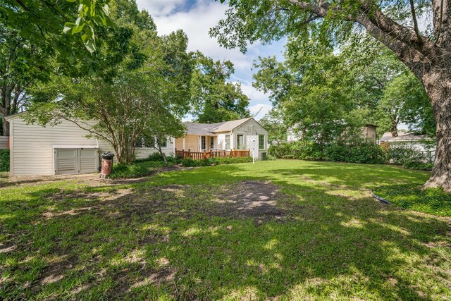 1312 Linden Ln, Garland, TX 75040 - view of grassy yard featuring a wooden deck
