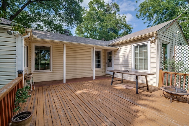 1312 Linden Ln, Garland, TX 75040 - wooden terrace featuring an outdoor fire pit