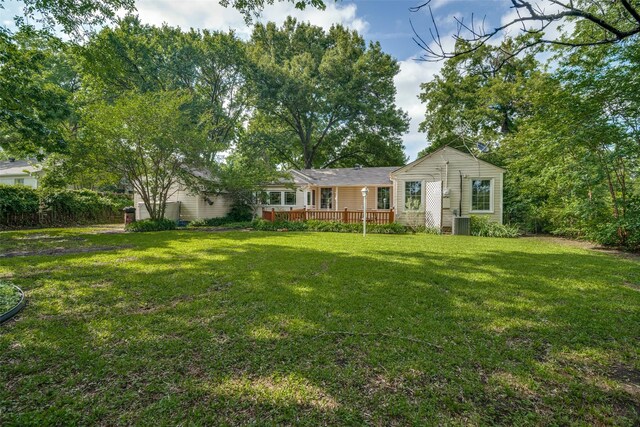 1312 Linden Ln, Garland, TX 75040 - view of front of home with a front yard and a deck