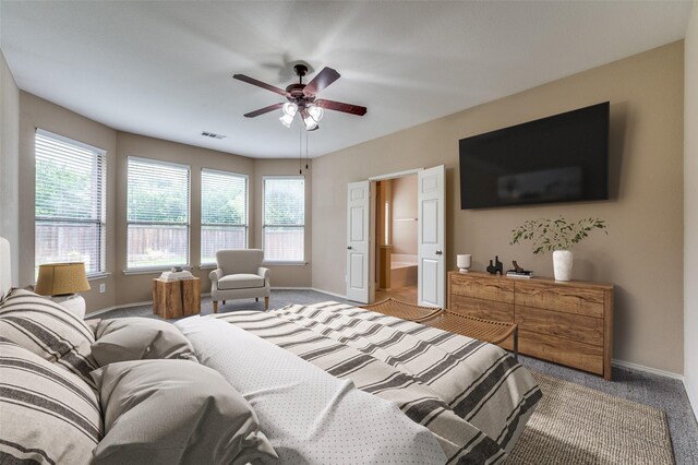 2748 Indian Oak Dr, Mckinney, TX 75071 - carpeted bedroom with multiple windows and ceiling fan