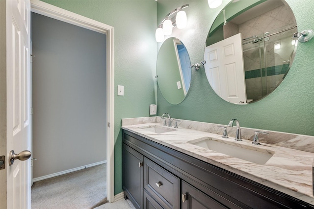 2748 Indian Oak Dr, Mckinney, TX 75071 - bathroom with a stall shower and double vanity
