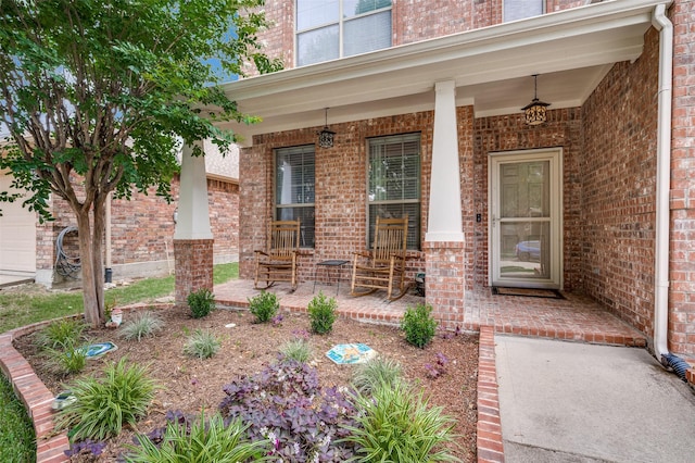 2748 Indian Oak Dr, Mckinney, TX 75071 - property entrance with a porch and brick siding