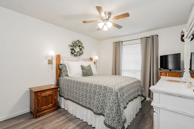 3615 7th St, Sachse, TX 75048 - bedroom featuring wood finished floors and a ceiling fan