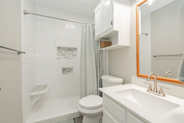 3615 7th St, Sachse, TX 75048 - bathroom featuring vanity and tiled shower