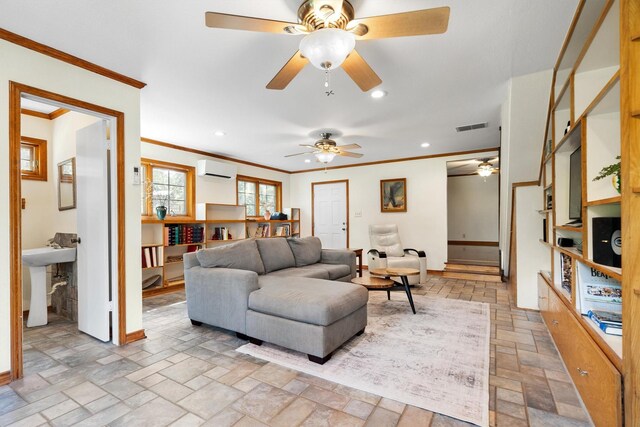 1933 E Hickory Hill Rd, Argyle, TX 76226 - living area featuring crown molding, stone tile flooring, a ceiling fan, a wall mounted air conditioner, and recessed lighting