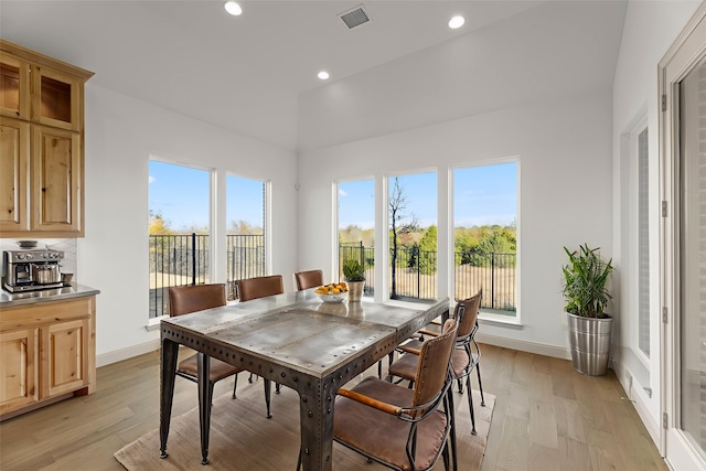 3148 Bryne Ln, Rockwall, TX 75087 - dining space with light wood finished floors and recessed lighting
